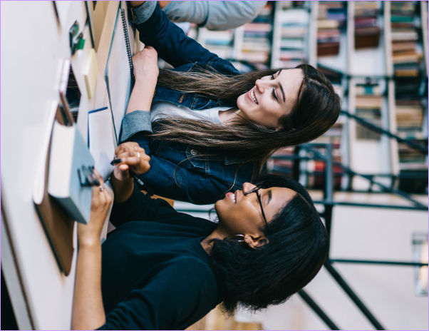 Students in a class looking at syllabus