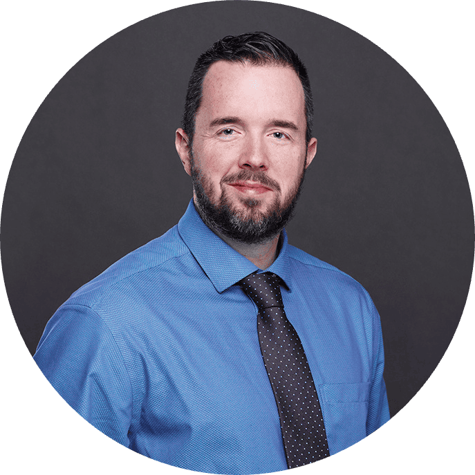 Graham Carlos headshot in a circle.