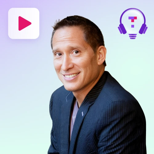 A man with short dark hair and a suit jacket smiles slightly, looking towards the viewer, against a light purple and green gradient background with a play button icon and a lightbulb with headphones graphic.